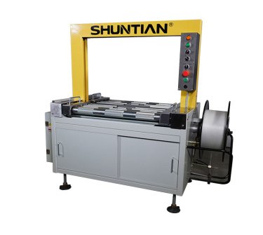 STDBA55AR全自动动力滚筒高台打包机