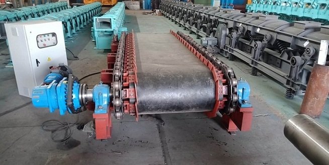 板式给料机在红土镍矿卸船输送工艺的应用